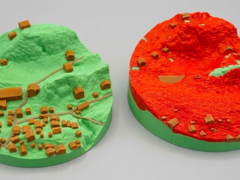 Photo of the printed model of Blatten, before and after