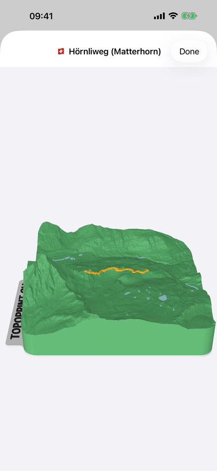 The model in 3D — terrain, water and the route raised as a ridge along the top. (English)
